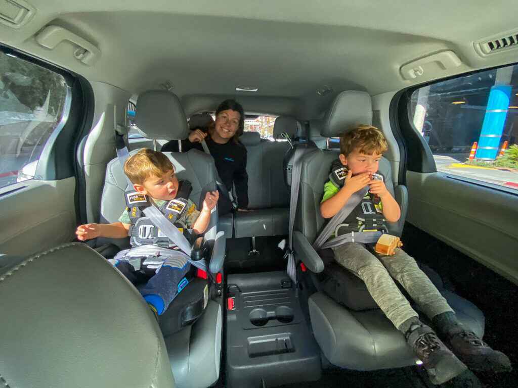 Houston family using airport car service with car seats at IAH Airport
