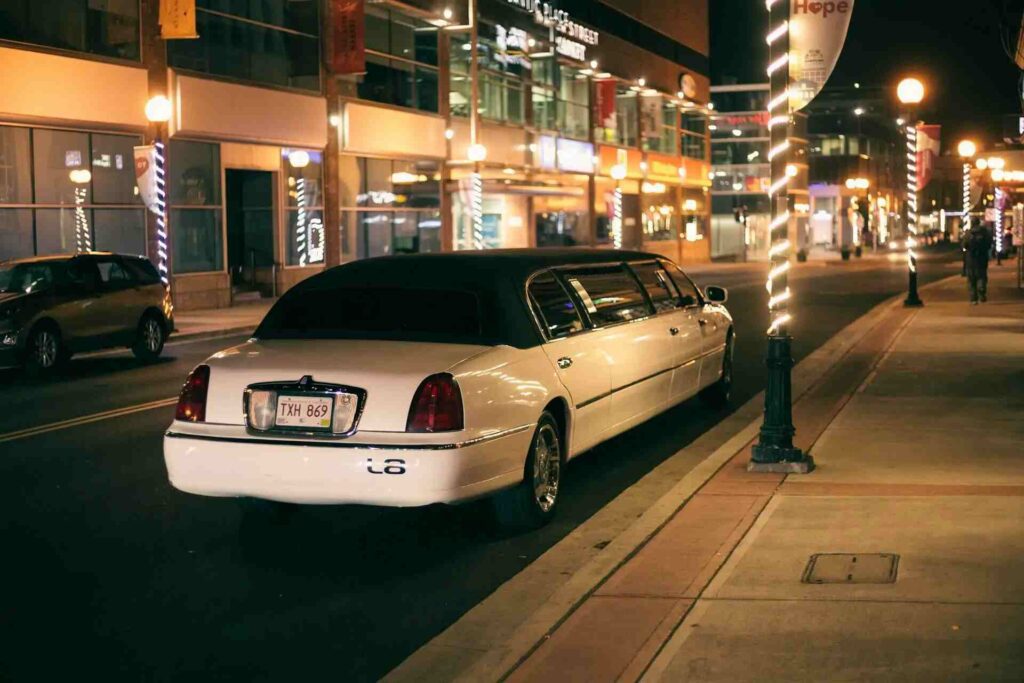 luxury limousine parked near a fine dining restaurant in Houston.